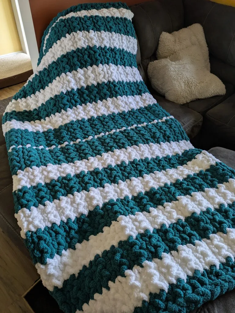 The memorial blanket unfolded.
