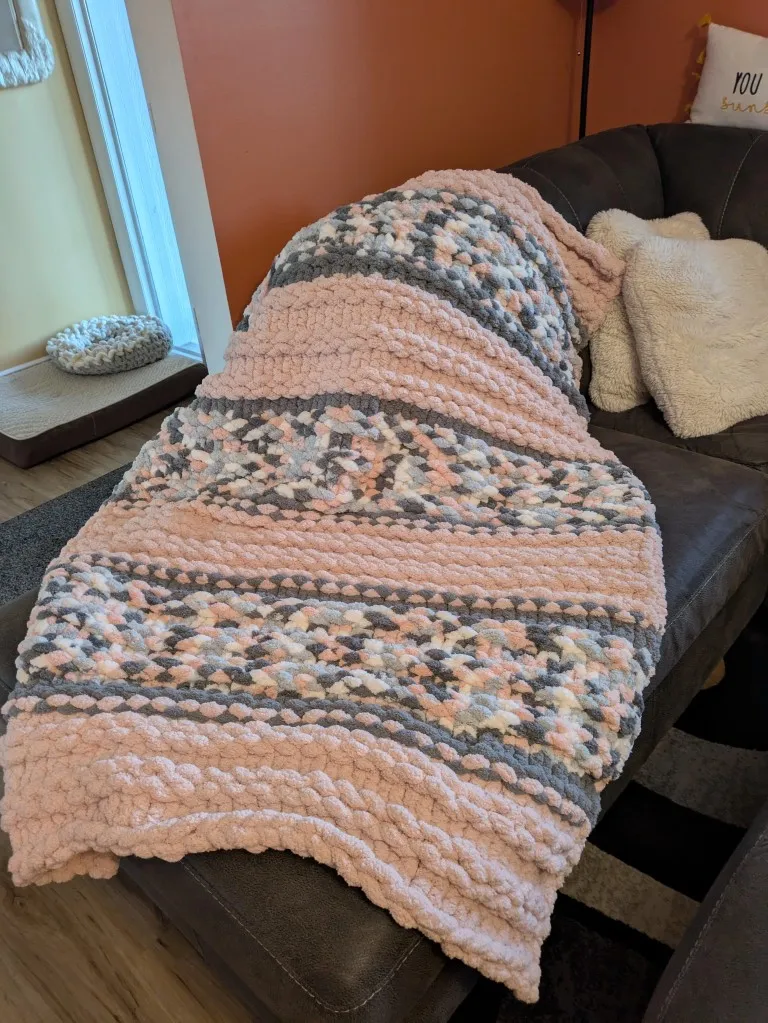 The memorial blanket unfolded.
