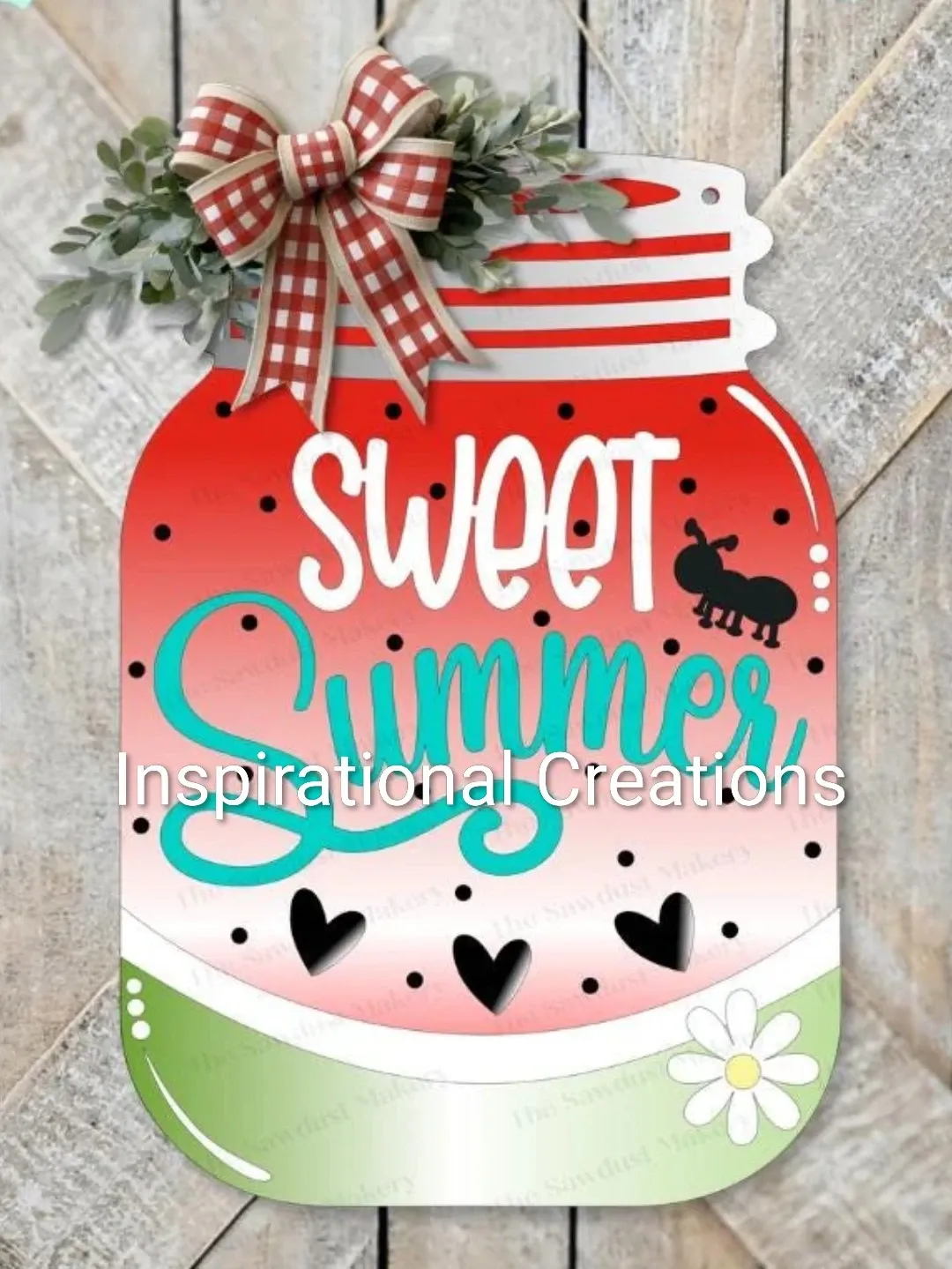 The Sweet Summer wooden jar has been painted red and green, with white and blue text, and a bow affixed to the corner.